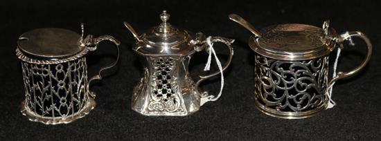 Victorian pierced silver mustard and two other silver mustards (one mount a.f)